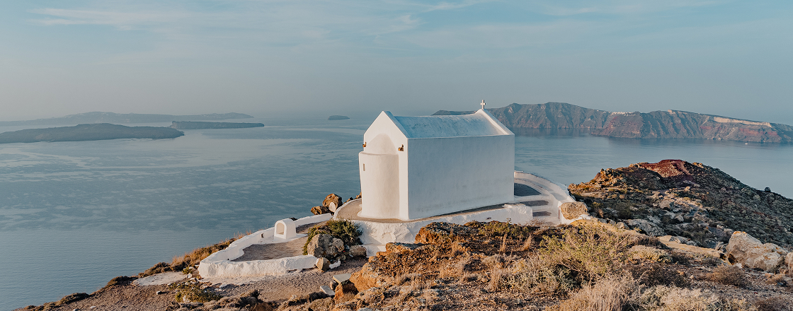 A Journey Through Ionian Beauty and Santorini Skies